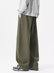 Men's relaxed fit army green sweatpants with drawstring and diagonal seam detail.