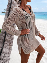 Open-knit beach dress in khaki with lace-up neckline and long sleeves.