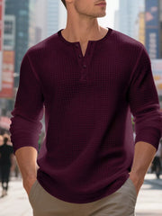 Men's waffle knit henley shirt in Wine Red with button placket and long sleeves.