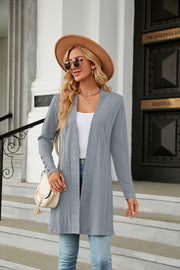 Light blue textured knit open-front duster cardigan with button detail on sleeves