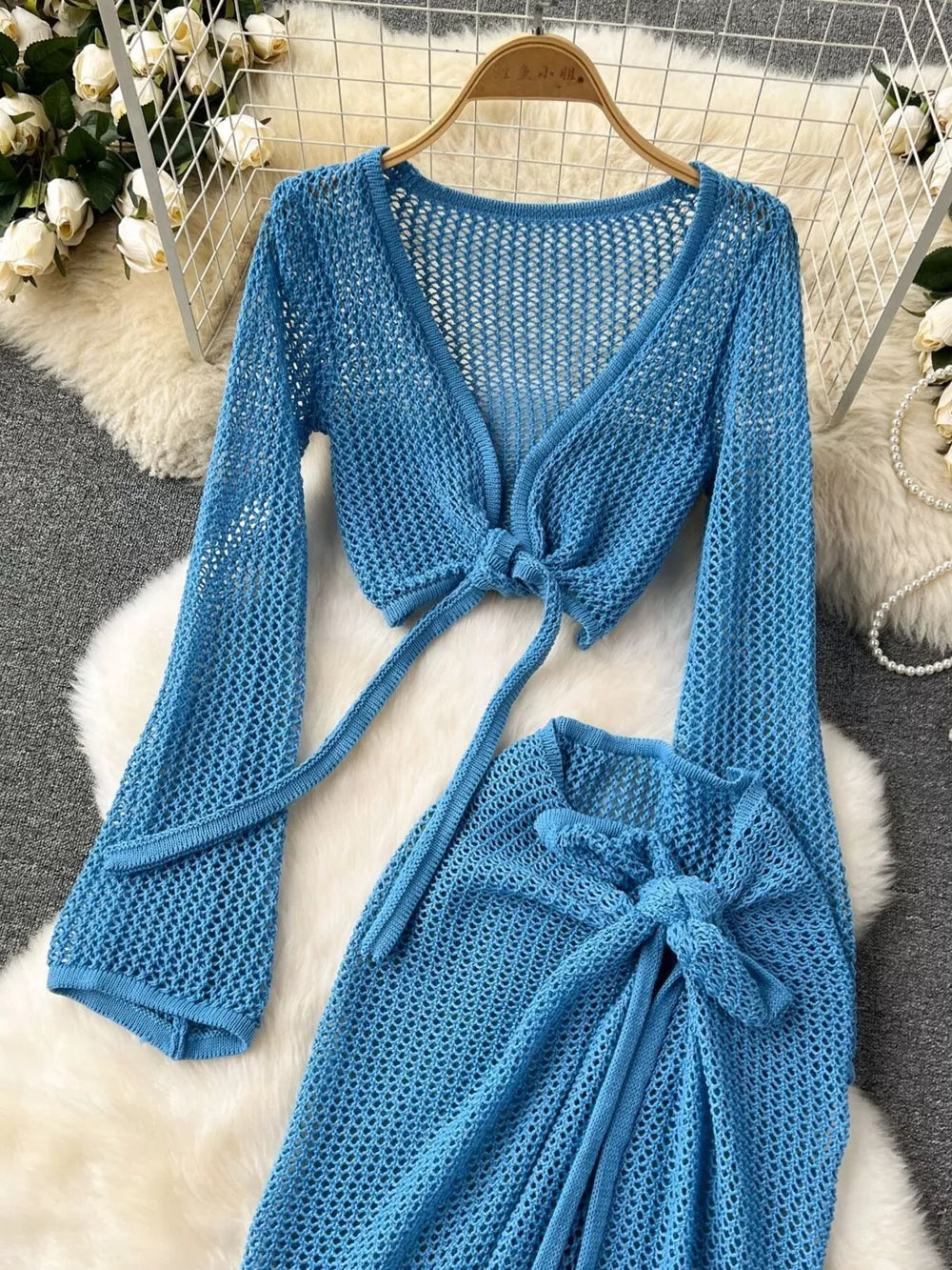Blue knit crop top with tie front and matching high slit skirt set