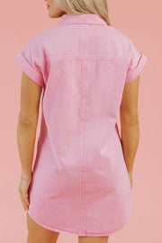 Rolled sleeve denim shirtdress in blush pink with button details.