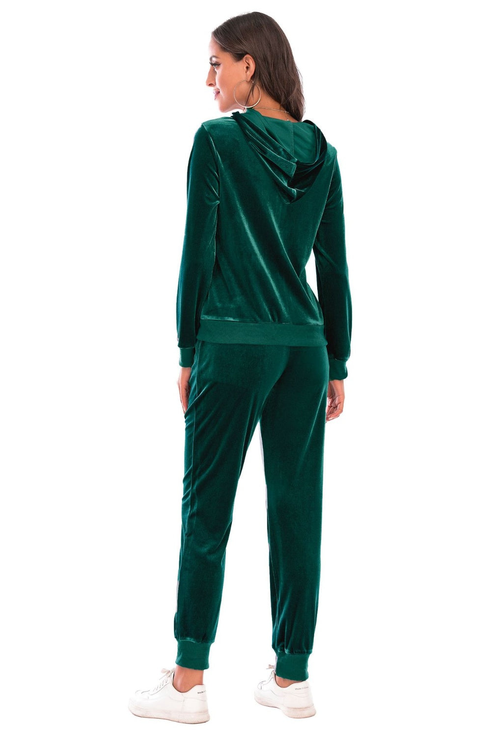 Green velvet loungewear set with hooded jacket and cuffed joggers.