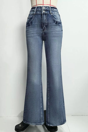 Classic high-waisted flare jeans in blue denim with distressed details and button closure.