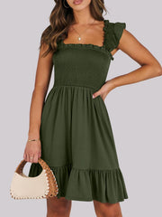 Army green smocked mini dress with ruffle hem and square neckline.