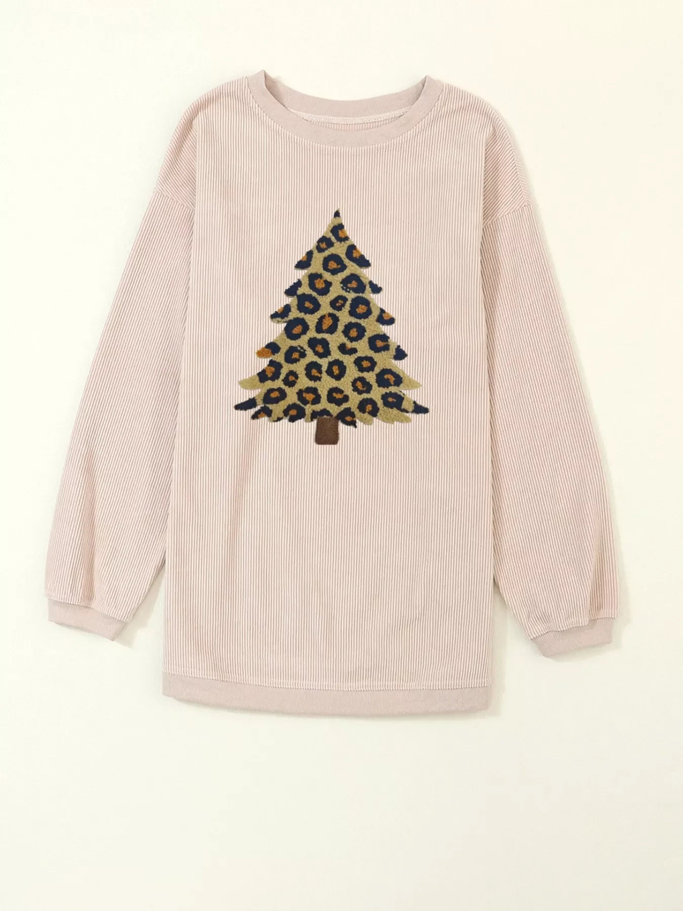 Eggshell corded sweatshirt with leopard print Christmas tree graphic.