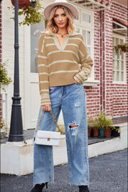 Tan striped knit sweater with polo neckline and v-neck detail.