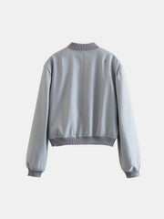 Boxy bomber jacket in light blue with ribbed collar, cuffs, and hem.
