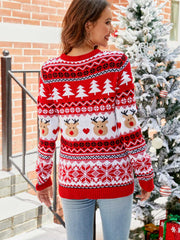 Red acrylic reindeer fair isle knit sweater with snowflake and Christmas tree patterns.