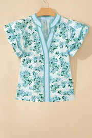 Floral print polyester blouse with flutter sleeves and striped trim