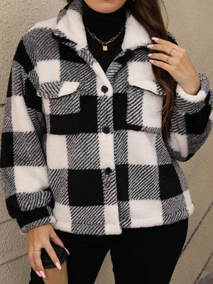 Black and white plaid shacket with fluffy texture and a cozy collar.