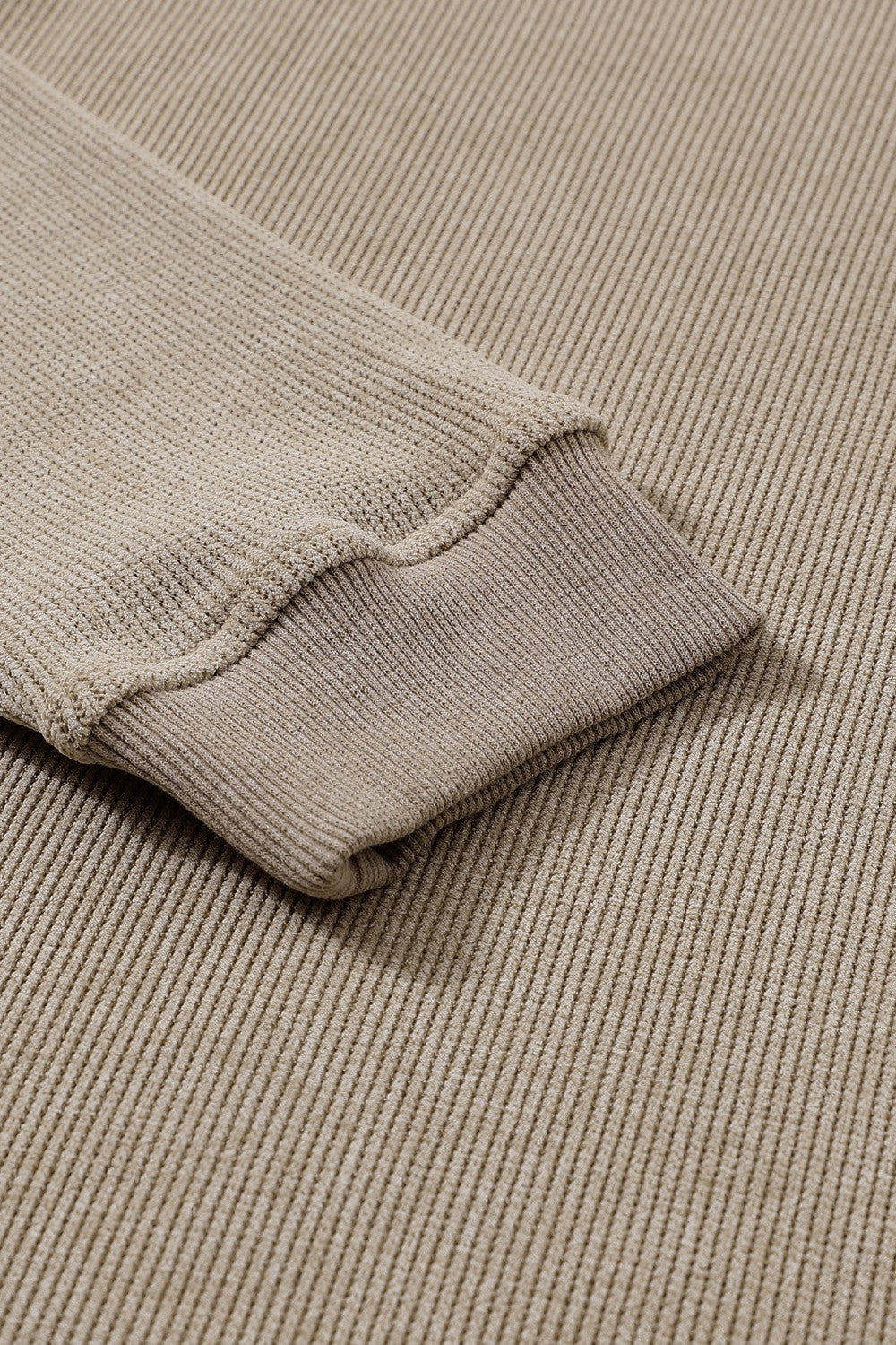 Tan textured ribbed sweatshirt with cuffed sleeve detail