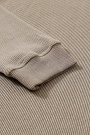 Tan textured ribbed sweatshirt with cuffed sleeve detail