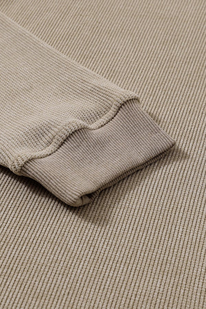 Tan textured ribbed sweatshirt with cuffed sleeve detail
