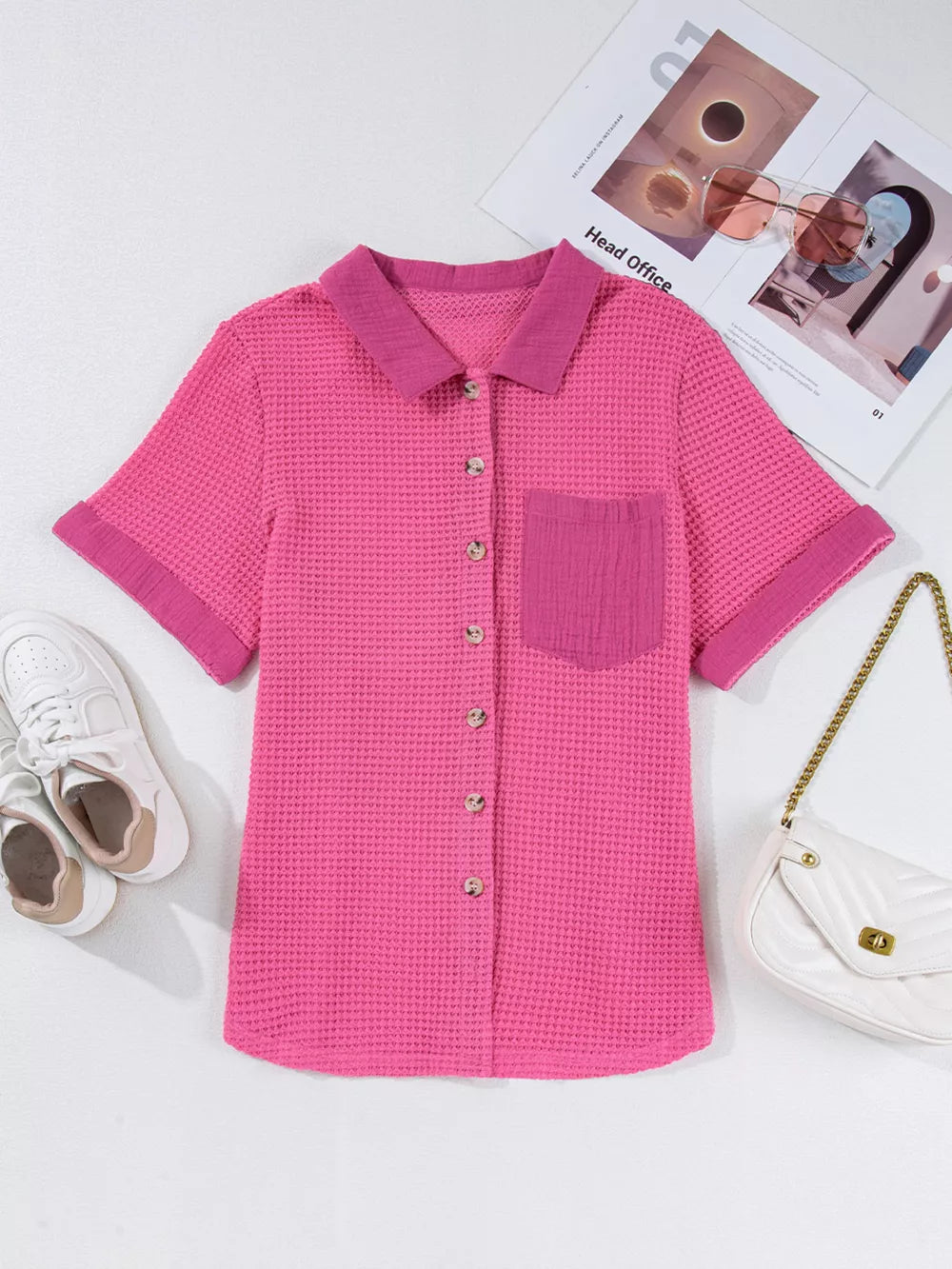 Waffle-knit button-down shirt in cerise with short sleeves and a chest pocket.