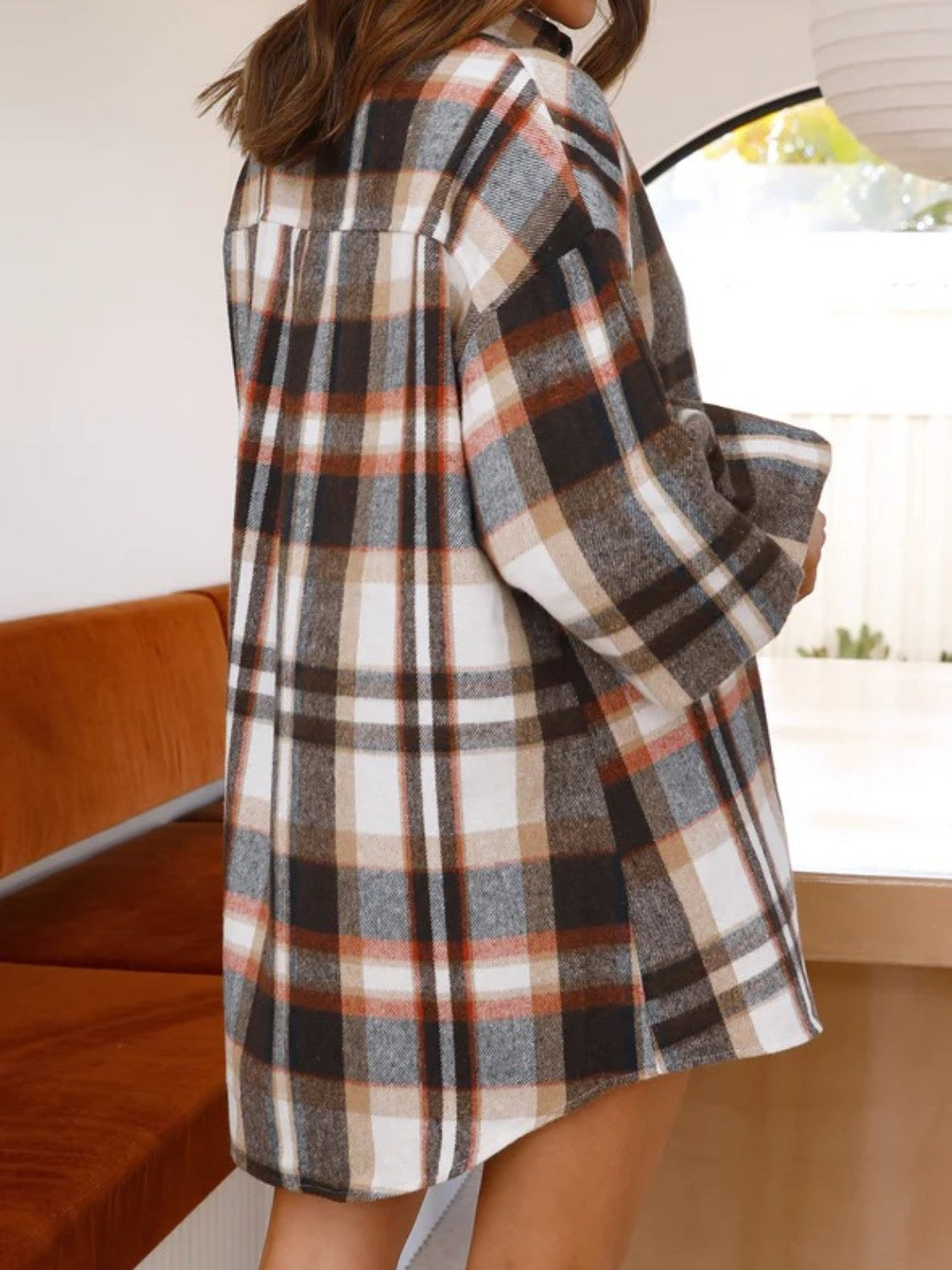 Brown plaid oversized shirt with balloon sleeves and a classic collar.