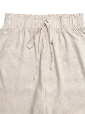 Beige maternity wide-leg trousers with elasticated waist and drawstring detail.