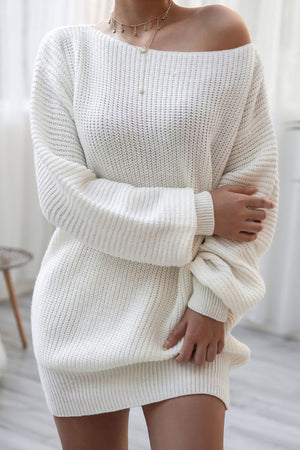 Off-the-shoulder ribbed knit mini dress in white with long sleeves and a boat neckline.