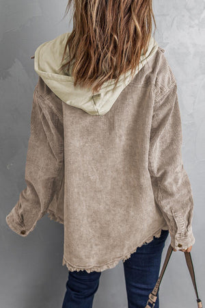Tan corduroy hooded utility jacket with frayed hem and contrast hood.