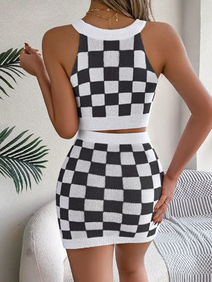 Checkerboard knit halter crop top and mini skirt set in black and white.