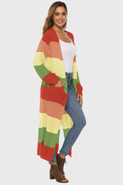 Maxi cardigan with rainbow stripes, pockets, and acrylic knit.
