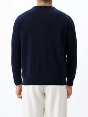 Men's navy ribbed sleeve knit top with a classic fit.