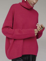 Cerise ribbed turtleneck knit sweater with relaxed fit and ribbed cuffs.