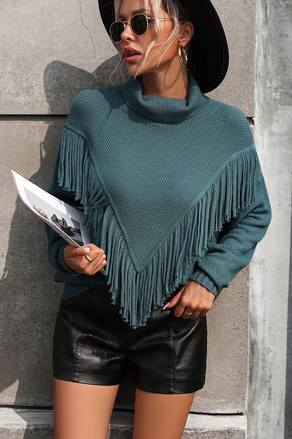 Deep Teal fringed chevron knit turtleneck sweater with a high neck.