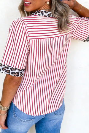 Red and white striped shirt with leopard print collar and cuffs.