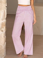 Pink plaid maternity pants with smocked waistband and wide legs.