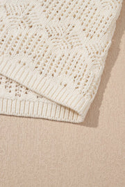 Beige crochet knit vest with eyelet yoke detail and ribbed trim