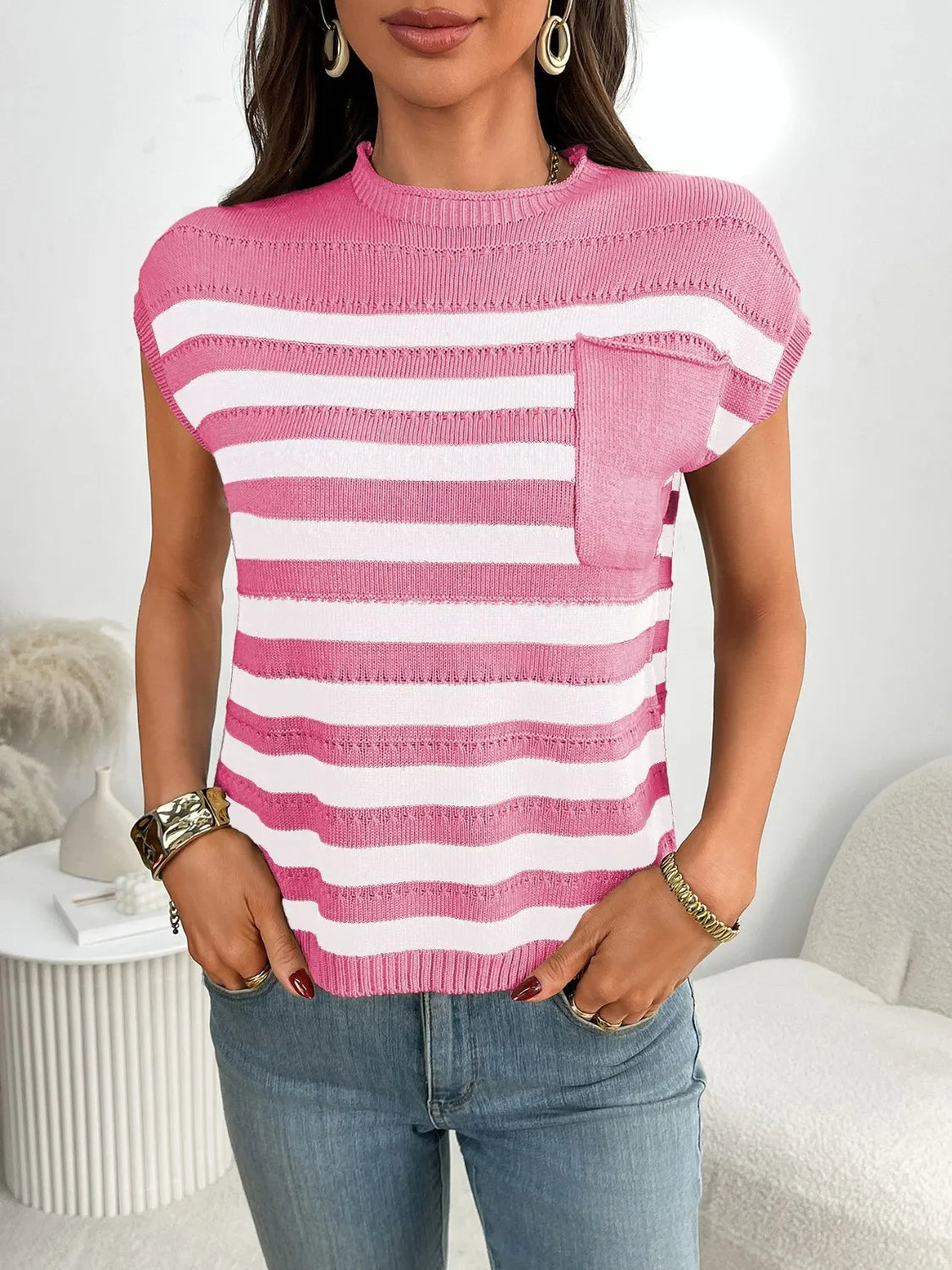 Striped knit pocket tee in blush pink and white with short sleeves and a crew neck.