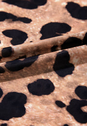 Sheer leopard print mesh blouse with a second-skin fit.