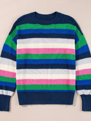 Chunky knit crewneck sweater with colorful horizontal stripes in navy, green, blue, white, and pink.