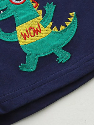 Navy cotton boys' underwear with a green dinosaur applique saying WOW.