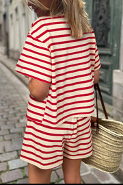 Tie-front lounge set in deep red and cream stripes, featuring a short-sleeve top and matching shorts.