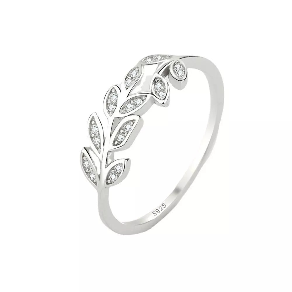 Delicate sterling silver ring with a leaf design accented with small crystals.