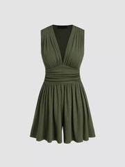 Army green ruched deep V-neck romper with cinched waist and a-line shorts.