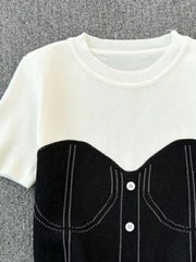 Color block knit t-shirt in white with black bustier detail and ribbed neckline.