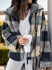Fluffy plaid zip-up shacket in black and white with a collared neckline.