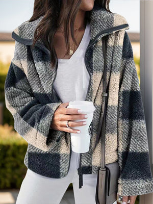 Fluffy plaid zip-up shacket in black and white with a collared neckline.