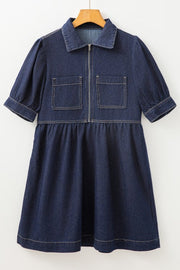 Dark denim mini dress with puff sleeves, zip front, and chest pockets.