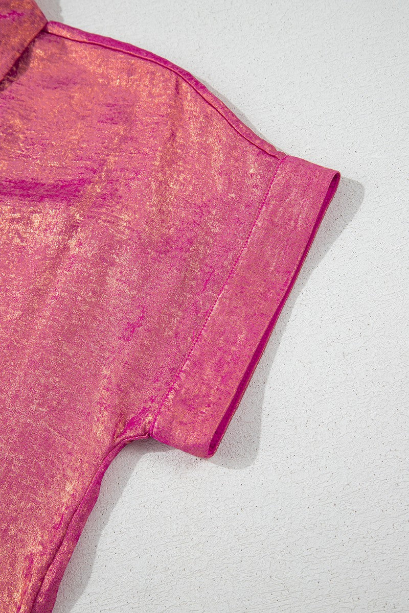 Dusty pink metallic oversized button-down blouse with short sleeves and a folded cuff.