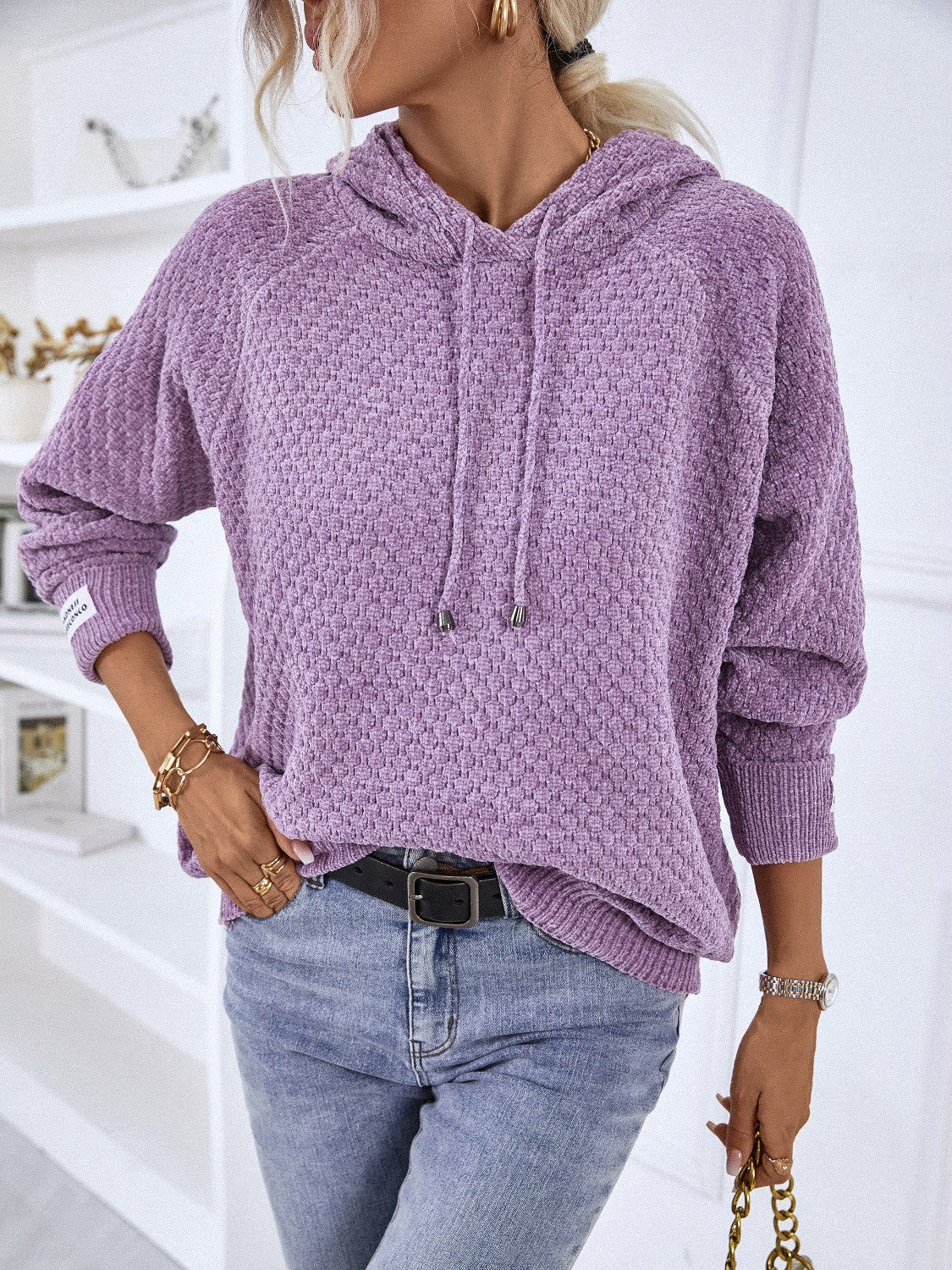 Lavender textured knit raglan sleeve hoodie with drawstring hood and cuffed sleeves.