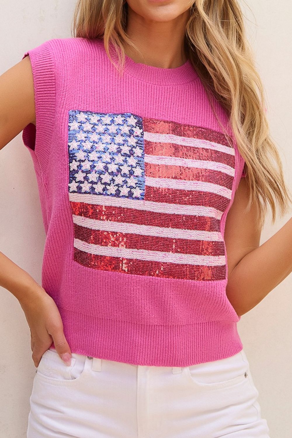 Fuchsia pink knit tank top with sequin American flag detail.