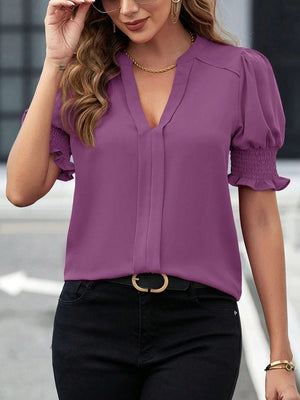 Mauve shirred sleeve plunge neckline blouse with ruffled cuffs