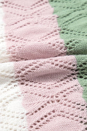 Crochet blouse with stripe pattern in pink, white, and green acrylic, featuring open knit details.