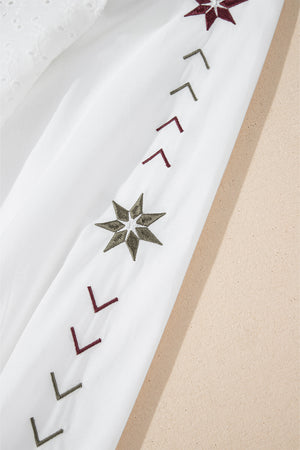 White embroidered eyelet blouse with star and chevron sleeve details