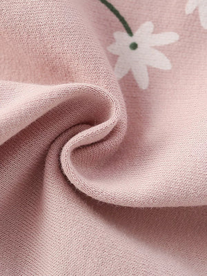 Blush pink cotton blend baby girls' undershirt with white daisy print detail