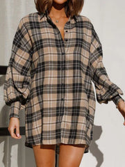 Taupe plaid shirting jacket with button front and ribbed cuffs.